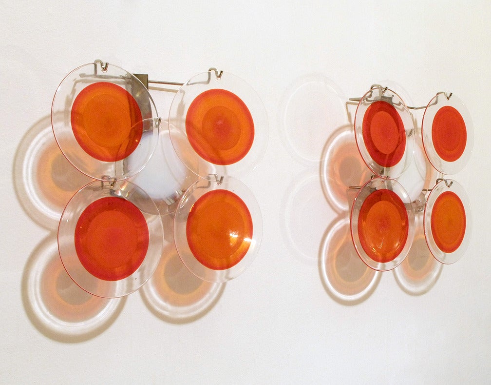 Late 20th Century Two Italian Glass Disk Wall Sconces by Vistosi