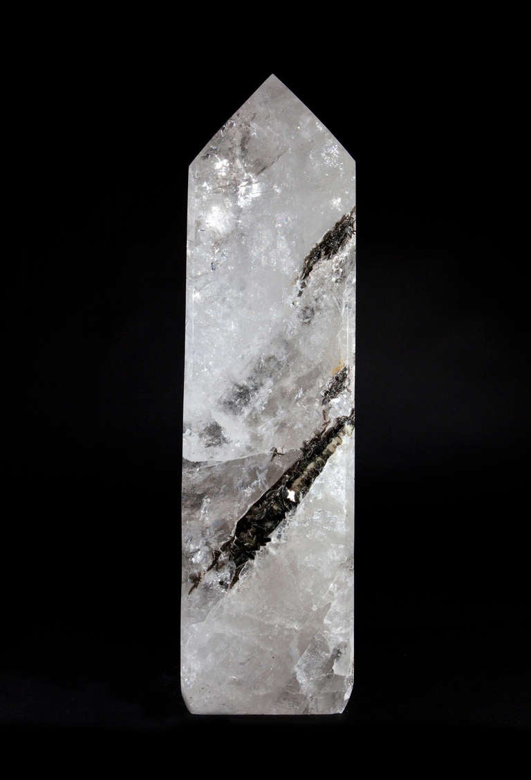 This remarkable piece of large Quartz Crystal has been laced with the mineral Mica throughout creating a cave-like feature through the centre of the piece.

- - -

About Dale Rogers

Since 1986 Dale has been sourcing the most unique fossils