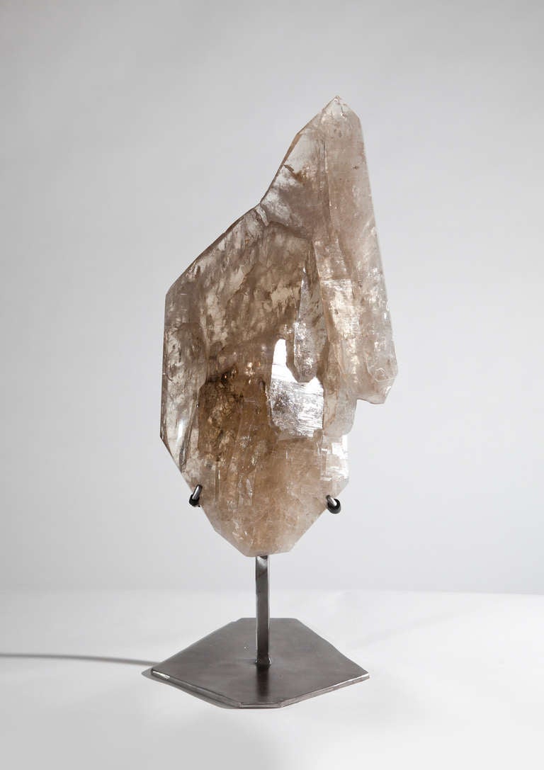 A large crystal of smokey quartz from Brazil, mounted on stainless steel stand.

- - -

About Dale Rogers

Since 1986 Dale has been sourcing the most unique fossils and minerals from around the world and through his company Dale Rogers