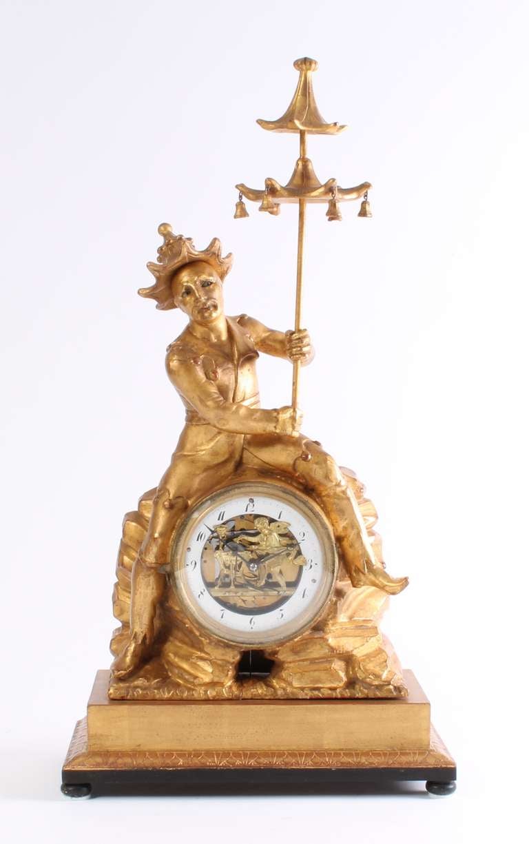 11-cm enamel chapter ring  with Arabic numerals and Breguet hands, skeletonized centre with gilt brass Cupid sharpening his arrows with connection to the half hour rack striking on a gong, 30-hour movement with silk suspended pendulum and anchor