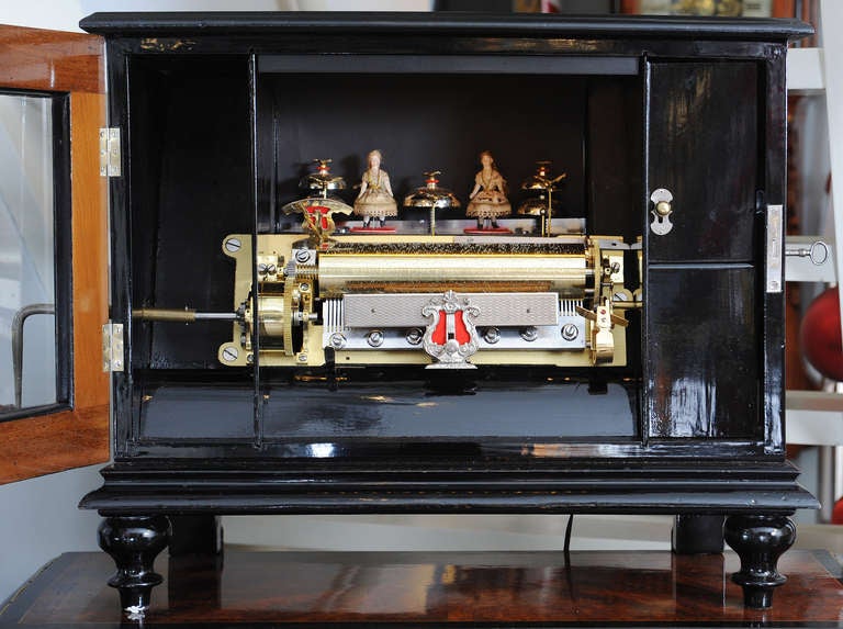 A Swiss Amboyna 'bells-in-sight' Cylinder Animated Music Box, ca. 1880