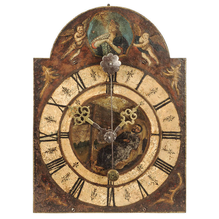 with quarter striking, original verge escapement, a so-called 'cow tail', iron wheels and porc pie bells on top. On a later bracket. Overall in very original condition.