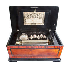 A French walnut 'bells-and-drum-in-sight' cylinder music box, circa 1890