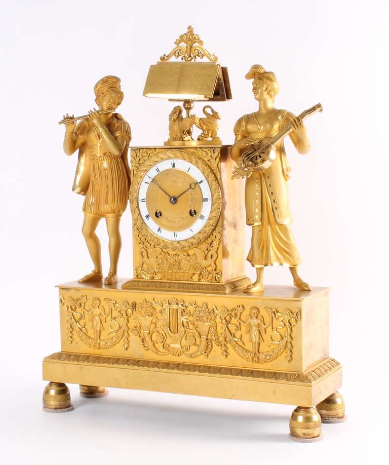 An eight day Empire mental clock with go and striking 9,5 cm enamel chaptering with Roman numbers and Breguet hands engraved center with the signature Bontemps a Paris. 