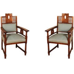 Antique A Dutch Art Deco mahogany dining room set of a table and four chairs, circa 1920
