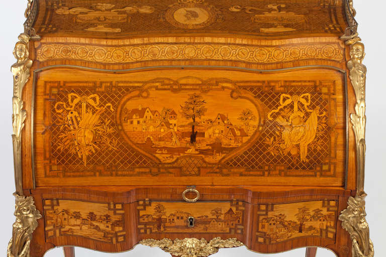 A fine amaranth, rosewood and fruitwood marquetry and parquetry 'bureau de dame' by Sormani, Paris second half 19th century. In Louis XV style, of lightly bombe form, the galleried top above a cylindre enclosing a leather lined writing surface and