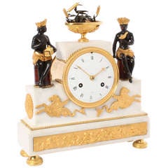 A fine French Directoire ormolu and marble mantel clock, circa 1790.