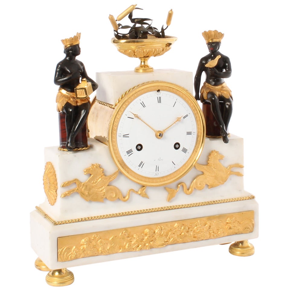 A fine French Directoire ormolu and marble mantel clock, circa 1790. For Sale
