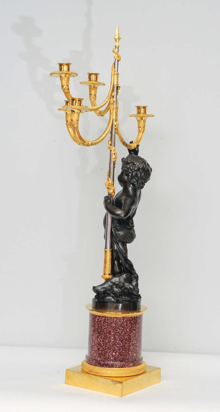 A pair of French gilt and patinated bronze 5-light candelabra on porphyry base In Good Condition In Amsterdam, Noord Holland