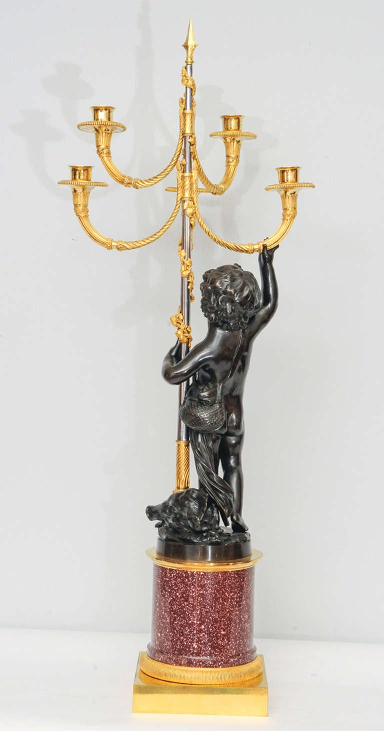 19th Century A pair of French gilt and patinated bronze 5-light candelabra on porphyry base