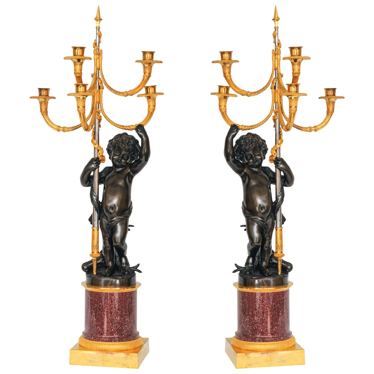 A pair of French gilt and patinated bronze 5-light candelabra on porphyry base