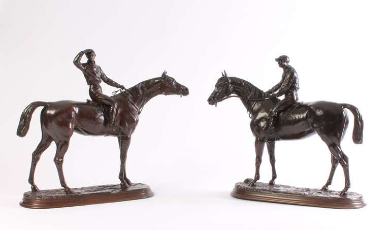 The first bronze with the Jockey turned sideways with raised arm signed and inscribed with title on the base: Avant la Course, J. Moigniez; the second bronze with the jockey holding both reigns signed and inscribed with title on the base: Retour au