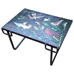 A beautiful Adnet wrought iron & enameled lava stone side table - France 1960's