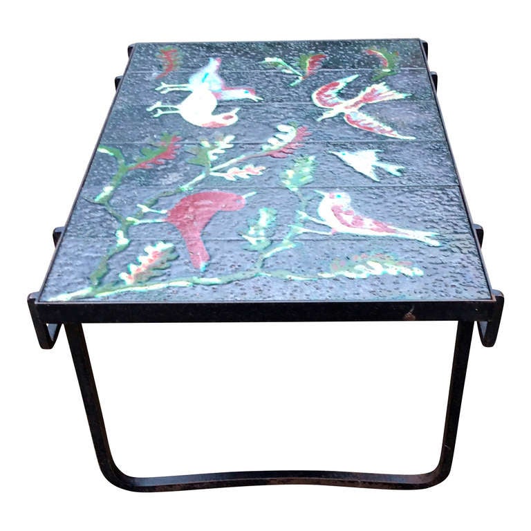 A beautiful Adnet wrought iron & enameled lava stone side table - France 1960's