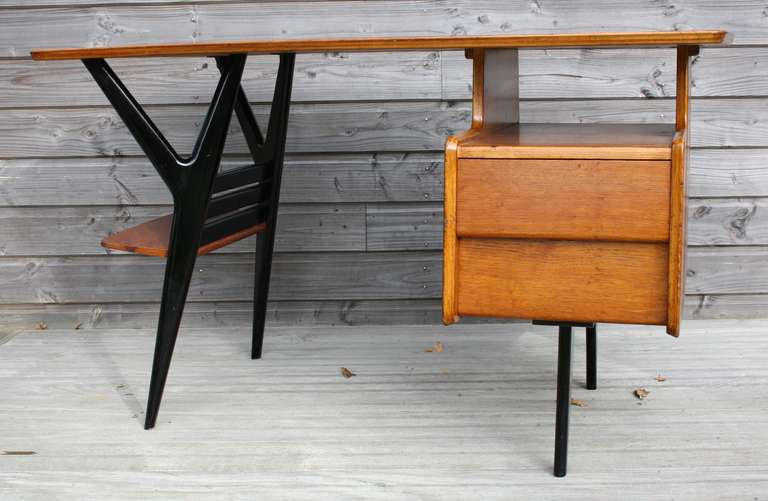a very rare desk by Louis Paolozzi - Editions Guermonprez - France early 1950's
Y shapes legs
chest of 2 drawers (darwer's width is 14,5 inches and depth of 24,8 inches)
recently refinished, in mint condition but for minor markings as show on