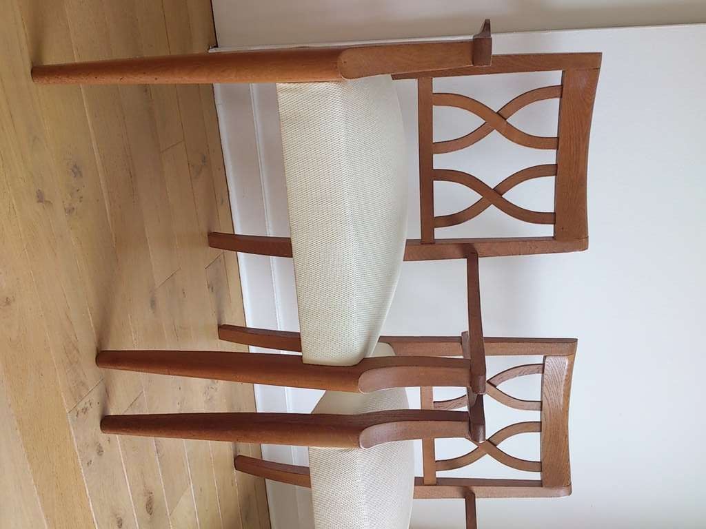 pair of Guermonprez 1960's oak armchairs 
massive oak
recently upholstered item is currently located in Paris France