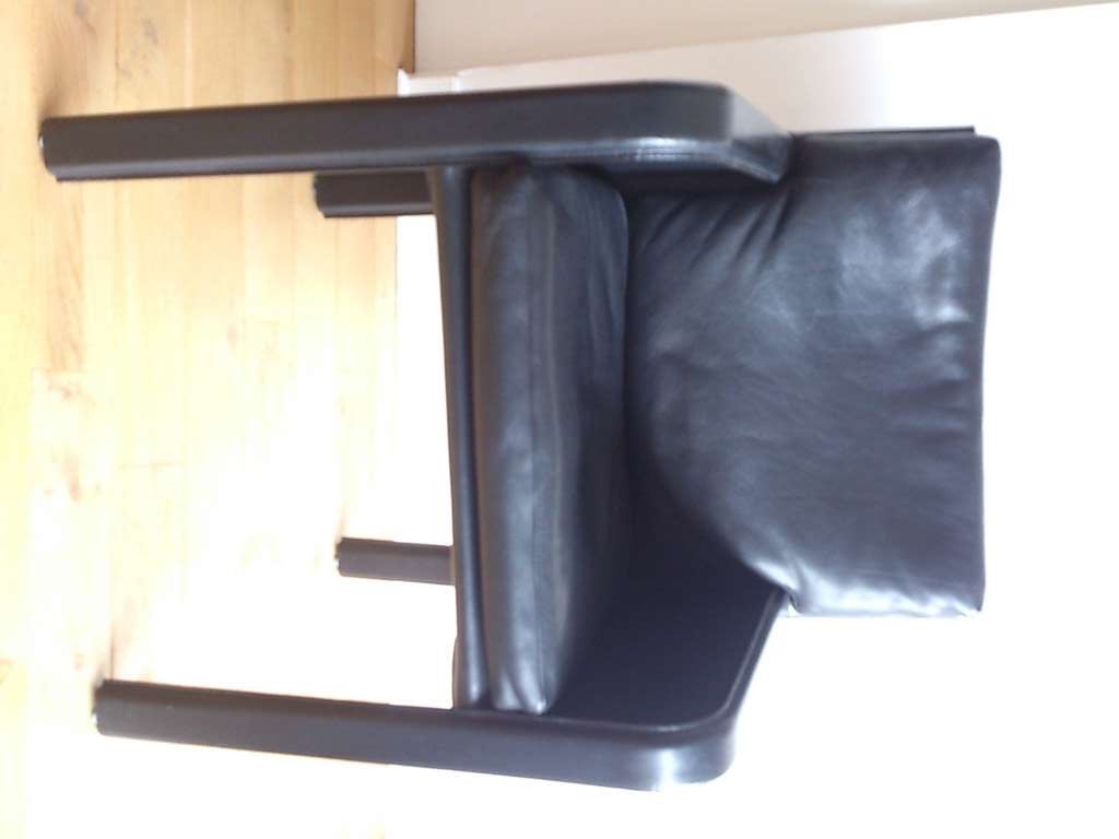 A very comfortable full balck leather seat by Matteo Grassi ; solid steel structure is covered with stiched thick leather 
side panels also padded with leather
chromed steel handle in the back
this item is currently in France, please kindly ask