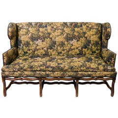 Antique Louis XIII French Sofa with Mouton Legs and Wing Sides and Loose Seat Cushion