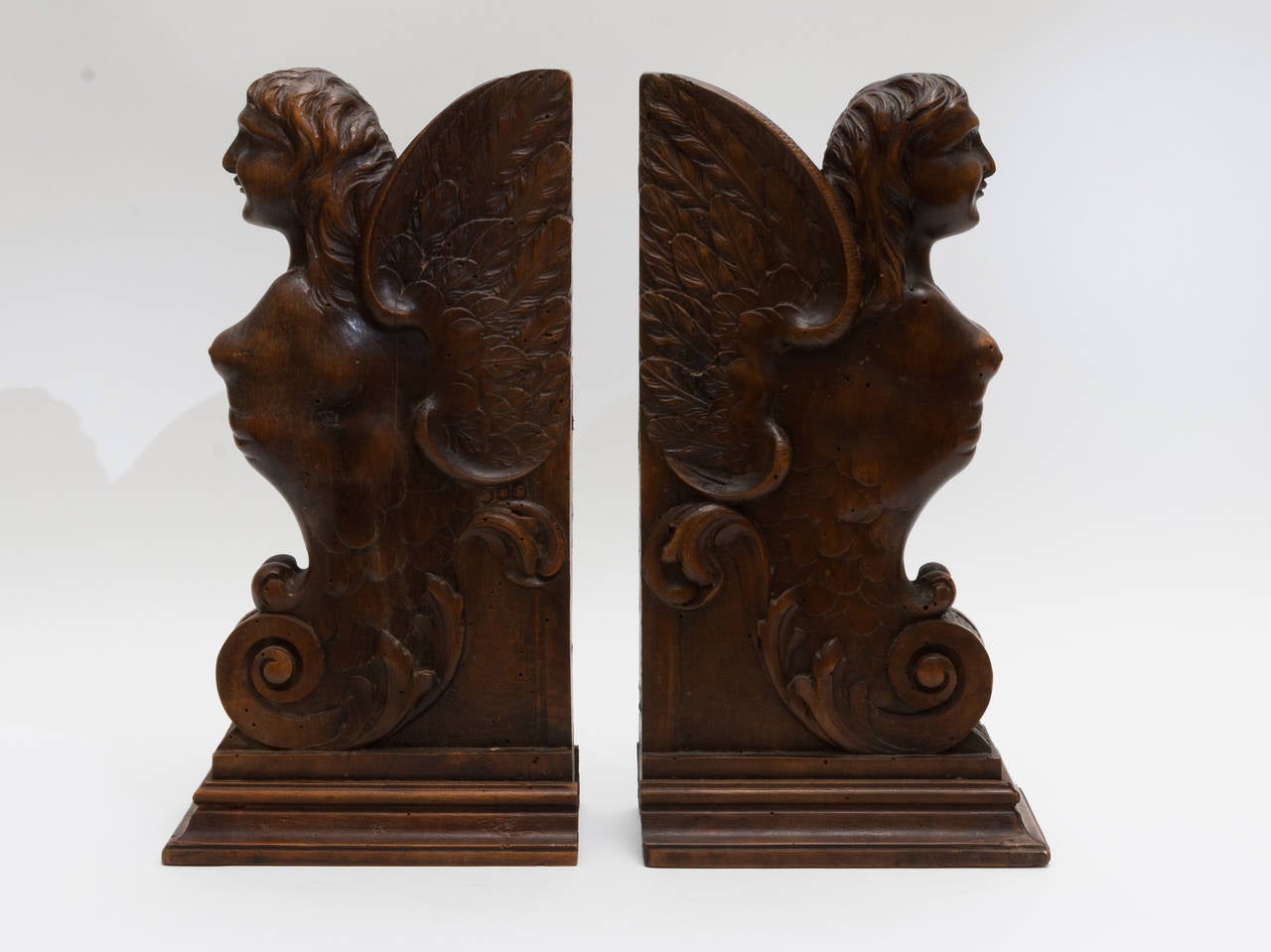 Beautiful pair of walnut carved bookend Sphinxes. Would go great any office from modern to traditional.