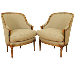 Pair of Carved, Painted and Upholstered Bergeres