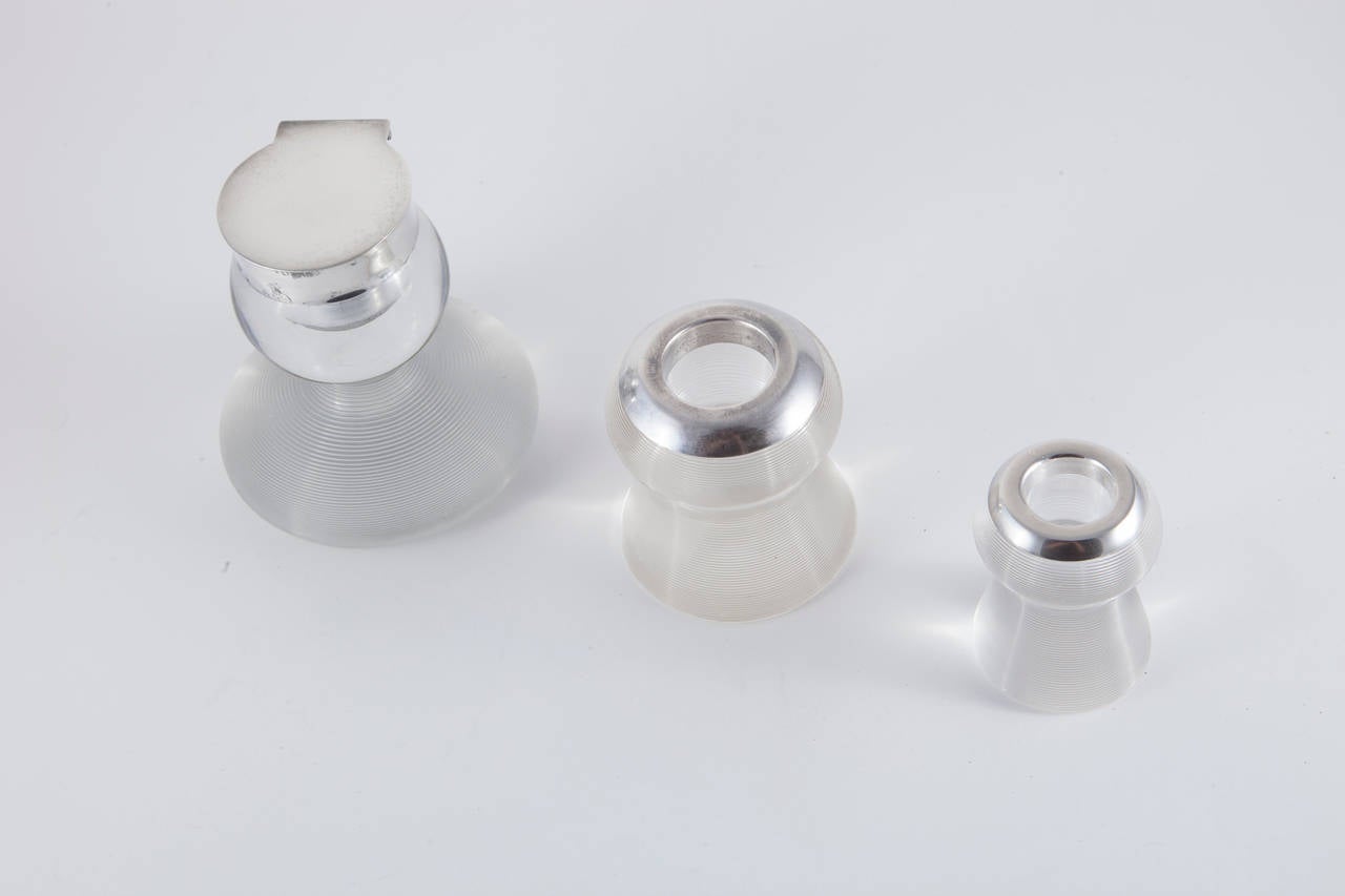 English sterling silver-mounted, threaded crystal match striker. Largest one is fully lidded, has half and half smooth to threaded crystal.
Measurements for smallest: Diameter 1.63, height 2.25,
Measurement for medium: Diameter 2.38, height 2.50.