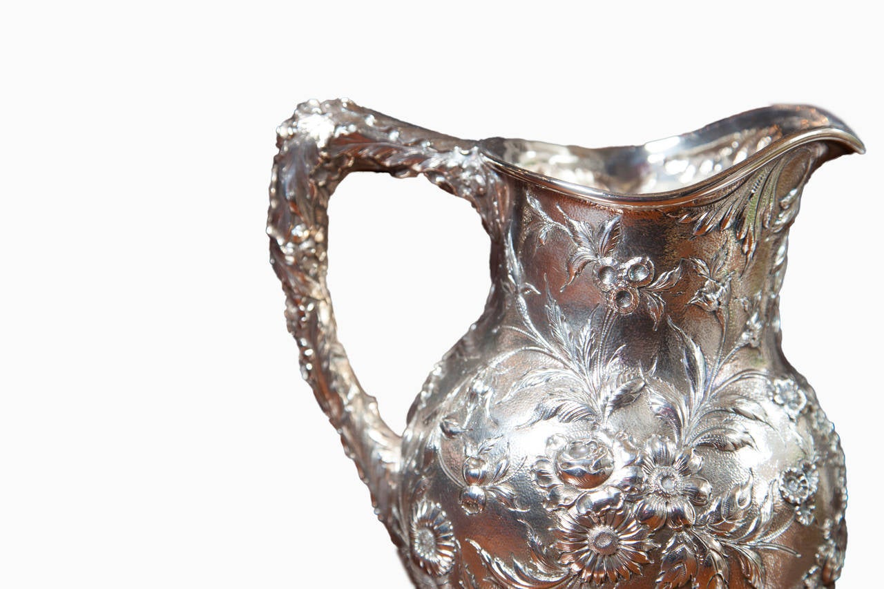 Antique early Kirk antique water pitcher with exquisite repose.