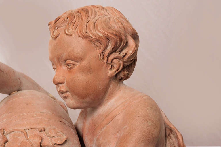 Louis XVII Terracotta Figures of Two Putti Holding an Urn In Good Condition In Nashville, TN