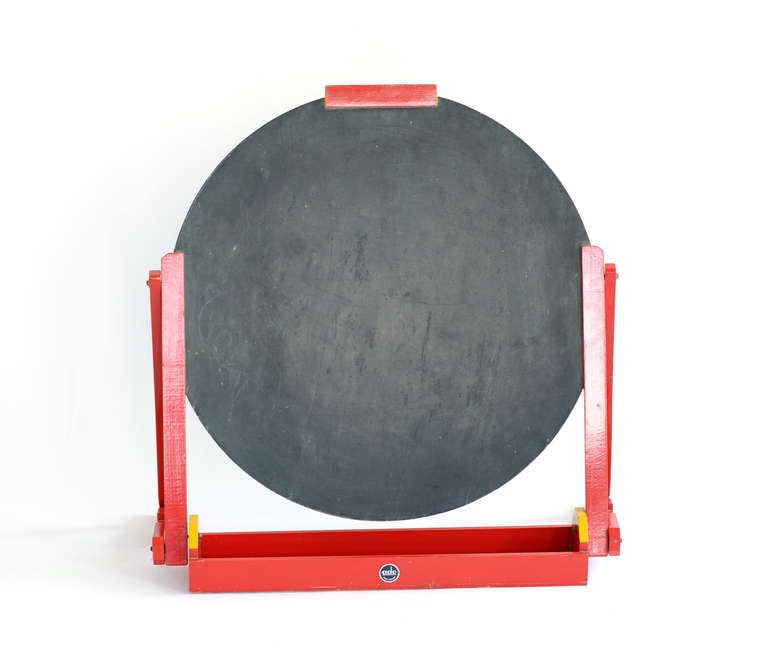 Child's chalkboard.
Designed by Ko Verzuu.
Netherlands, 1920s.
Marked: Ado Nederl. Fabrikaat (badge); height is adjustable.
H 25 in, W 24.25 in, D 4 in; depth 11 in when opened.
Material: Painted wood and plywood.