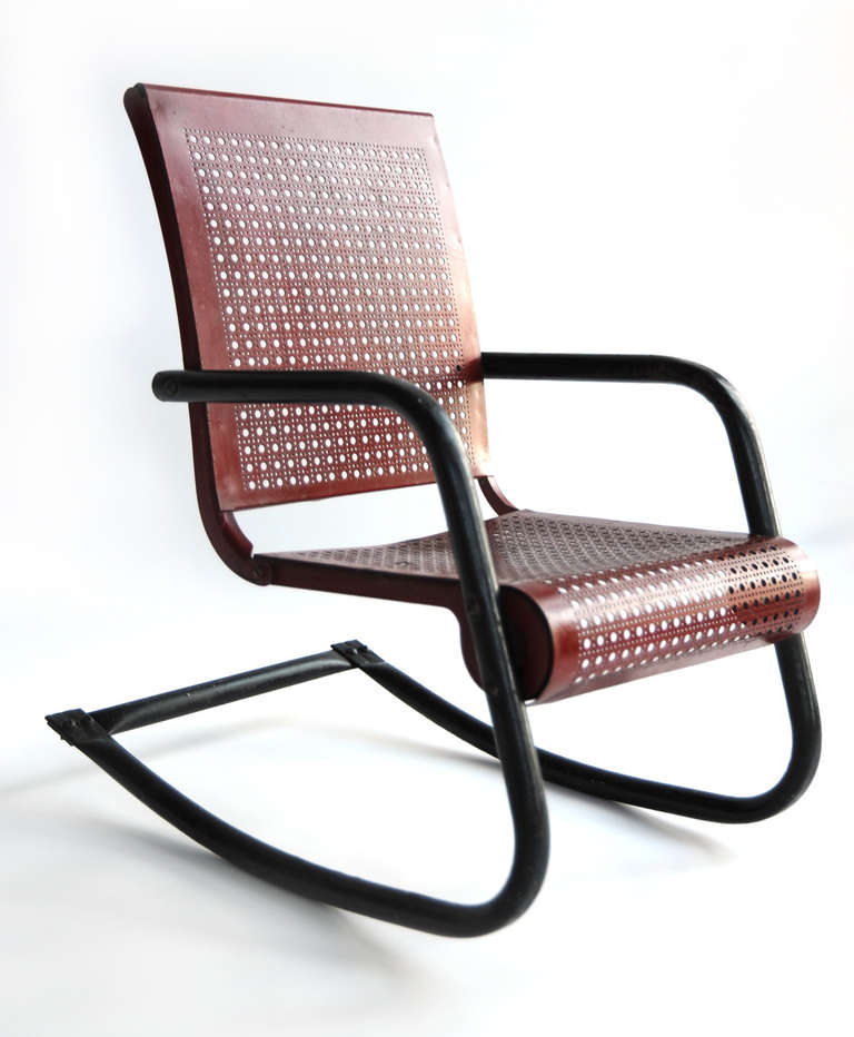 1950s Red Metal Mesh and Black Iron Frame Child Rocker

Vintage

H 24 in, W 15 in, D 23 in
