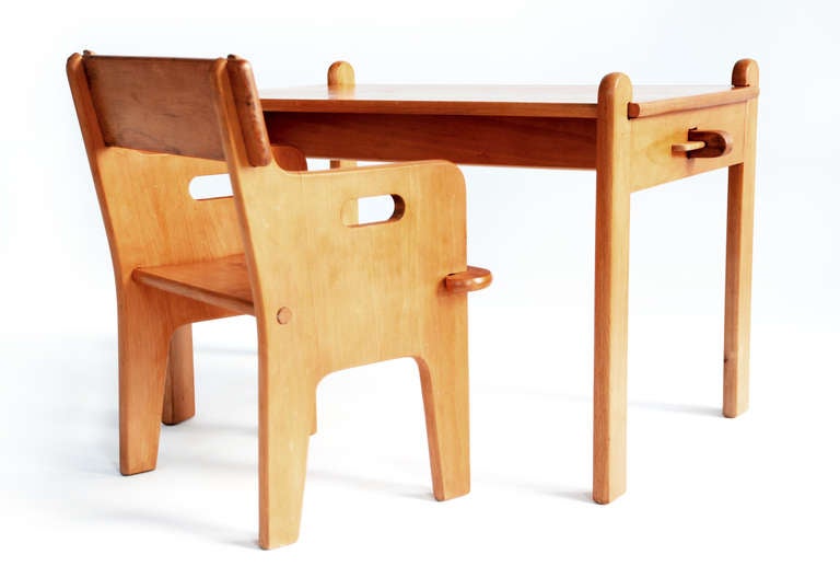 Peter's chair and table or child desk set in wood by Hans J. Wegner, 1944

Designed by Hans J. Wegner
Denmark, 1944
Beech wood
Measures: Table: H 17.75 in, W 28.25 in, D 17.75 in
Chair: H 18.5 in, W 16.5 in, D 12.5 in (seat H: 9.5 in)

Can