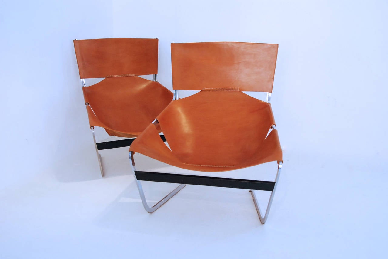 Pair of seats P444 designed by Pierre Paulin for Artifort in 1963, France.
The chromed metal frames are in good condition. The cognac leather has been new upholstered, according to the original.