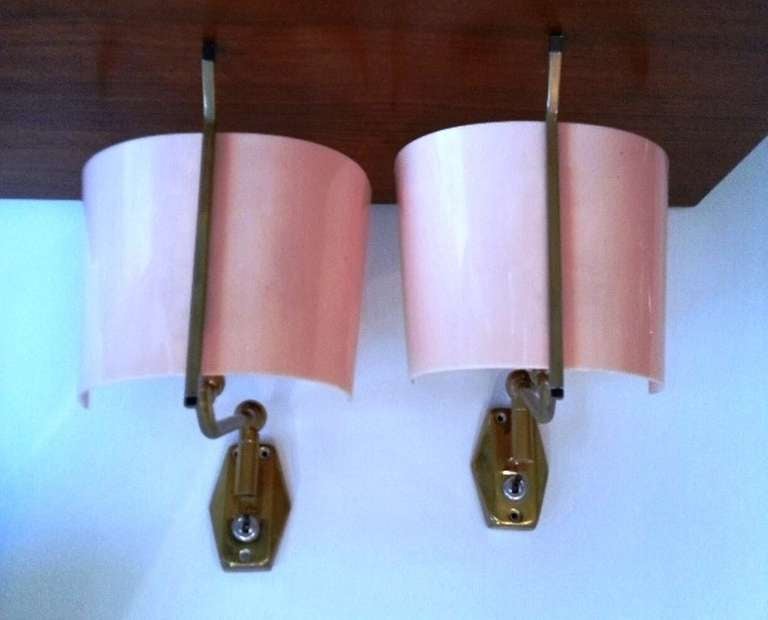 Pair of Italian 1950's wall light by Stilnovo. Marked with label inside and engraved 