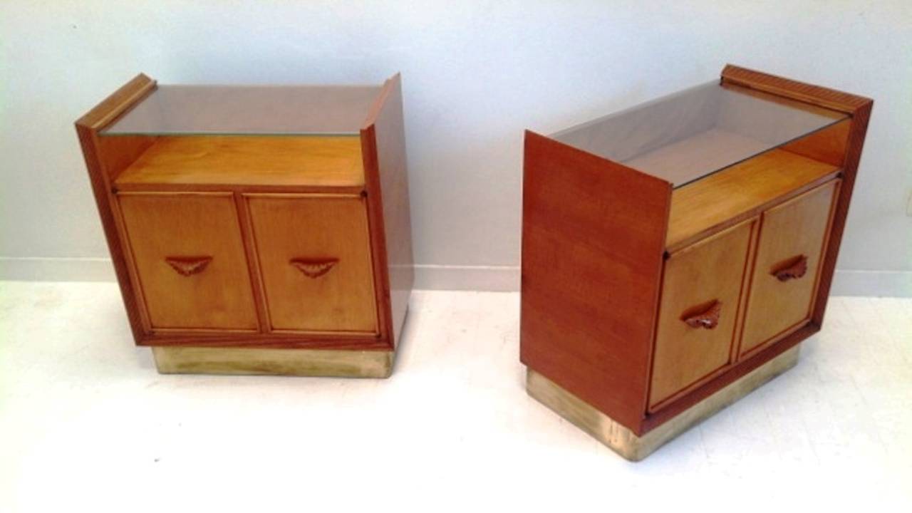 Exquisite 1940s chest of drawers and bedside tables, brass base, cherrywood and maple interior, carved handled. 
The cabinet is: cm 160 by cm x 55 by cm 90 H.
The bed sides are: cm 64 by cm 37 by cm 67 H.