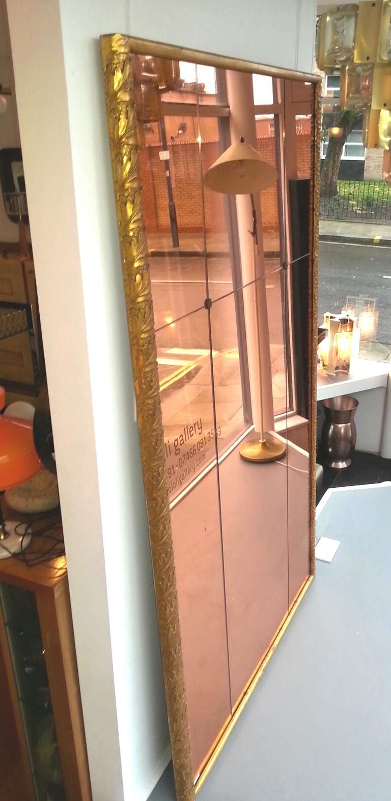 Exquisite custom made big peach mirror with Giovanni Gariboldi leaf motif.