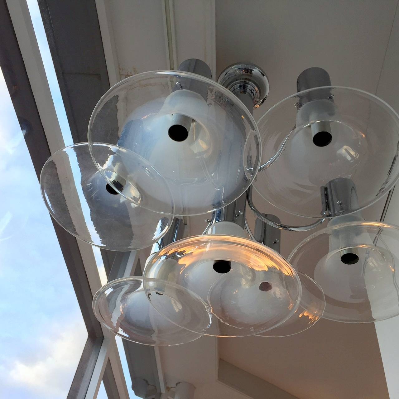 Amazing seven glasses ceiling lights. Chromed structure and large stylized blown glasses shades.