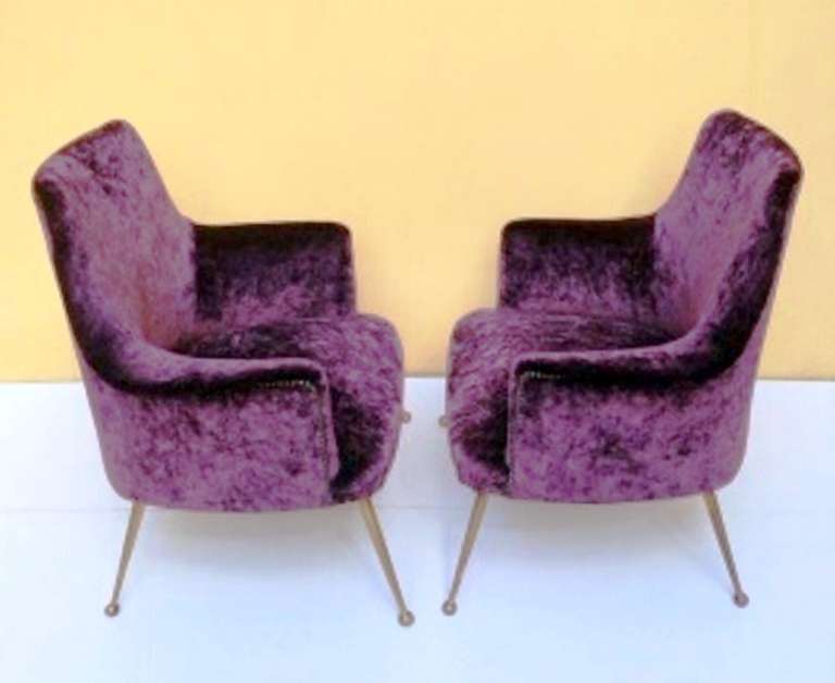 Pair of  small armchairs with original  brass legs
Newly recovered .