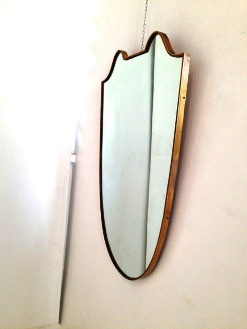 Elegant and original 1950's brass framed mirror