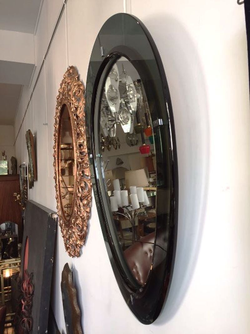 Chic tear drop's gray-green mirror, nice bevelled in the inside and outside of the glass frame.

Many pieces are stored in our warehouse, so please click CONTACT DEALER under our logo to find out if the pieces you are interested in seeing are on