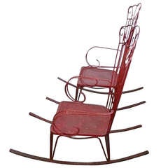 Vintage 1950.s wrought iron rocking chairs