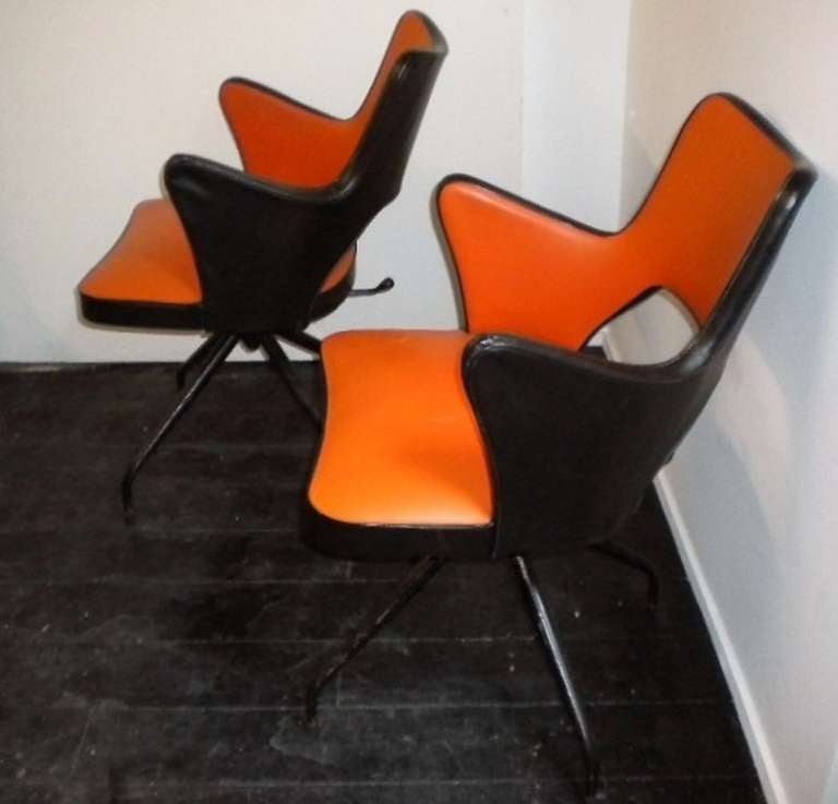 Pair of unusual 1950's  swivel chairs
 original vinyl and conditions