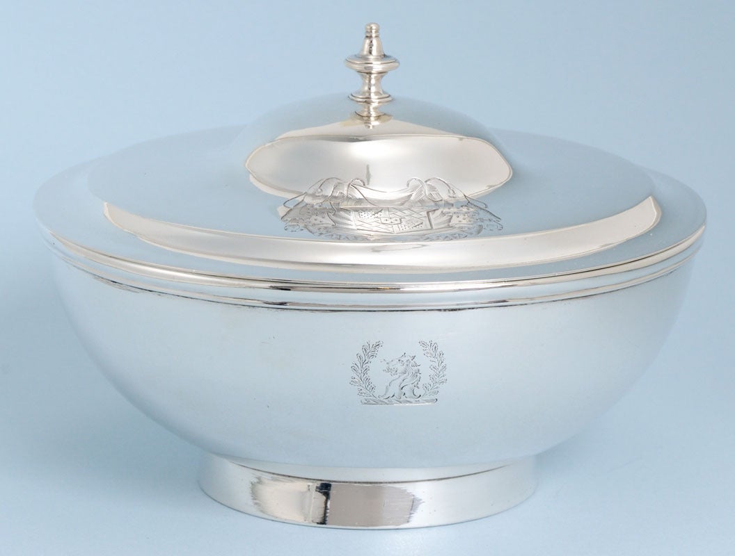 Very well proportioned and elegant George III, sterling silver bowl with cover. Made in London in 1809. The maker is unknown because the maker's mark is virtually indistinct, as it has been malstruck on the curve of the bowl. The rim of the lid is