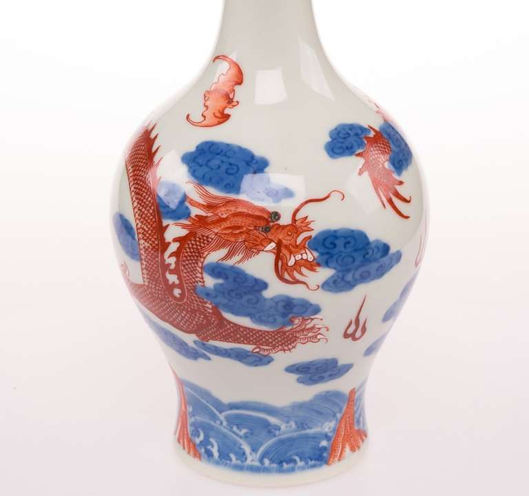 Iron Red and Blue Vase With a Long Neck