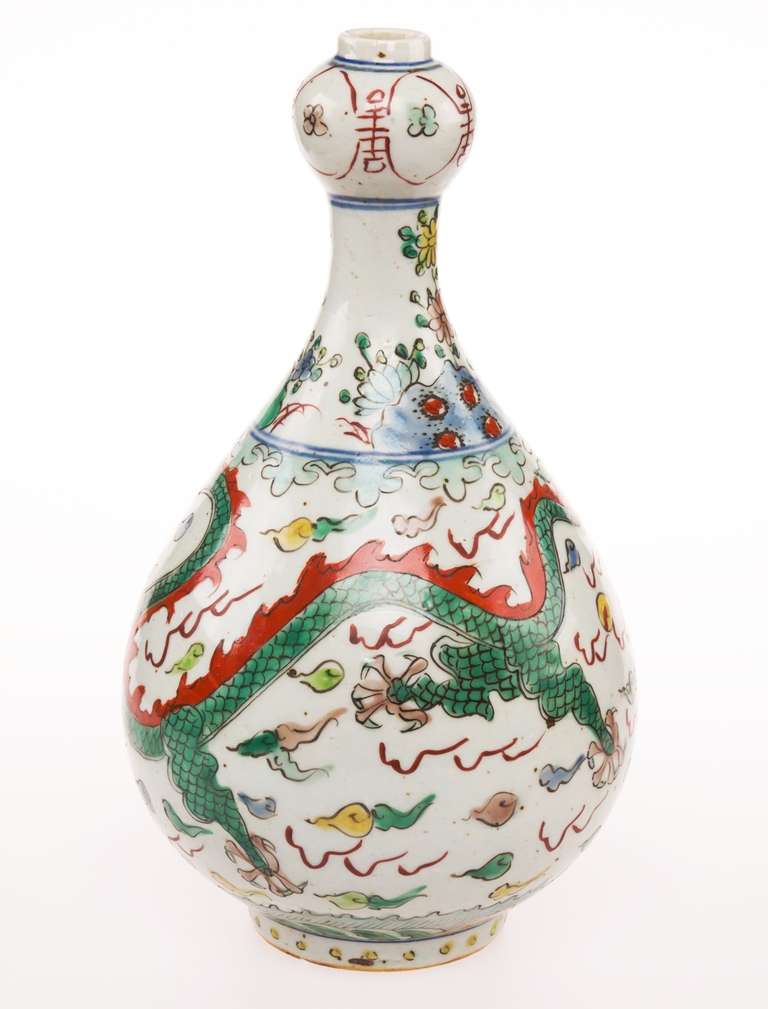 Porcelain vase with design of dragon and phoenix.