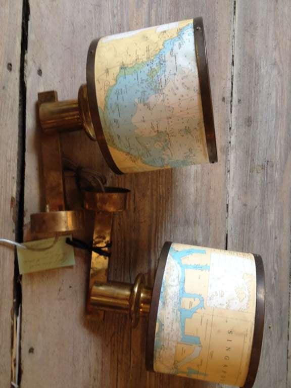 Pair of brass sconce arms from a Circa 1960's cruise ship with vintage charts converted to shades.  Rewired for American use and takes a regular size bulb.