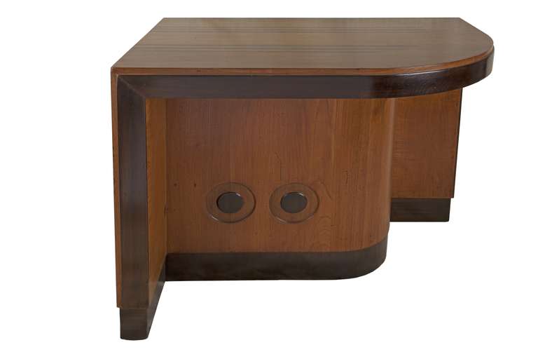 Deco Period teak desk with rosewood accents and inlay.  Originally a concierge desk from a late 40's cruise ship.  Designed so that two people can be seated at opposing ends.