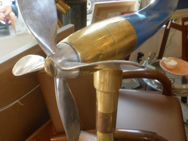 This is a cool midcentury nautical instrument from a merchant ship. An anemometer used to measure wind speed and an aerovane to measure direction. Originally there would be cables connecting this instrument to a panel on the bridge of the ship. This