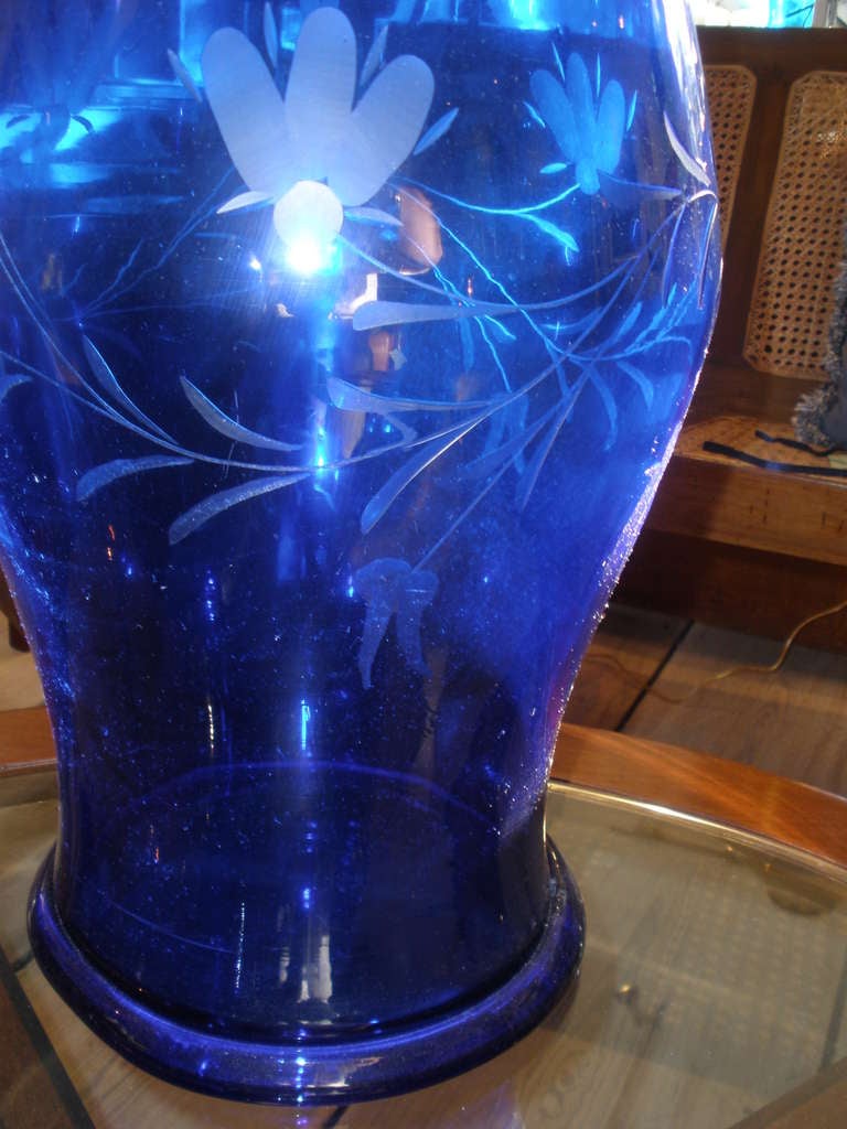 blue glass hurricane lamp