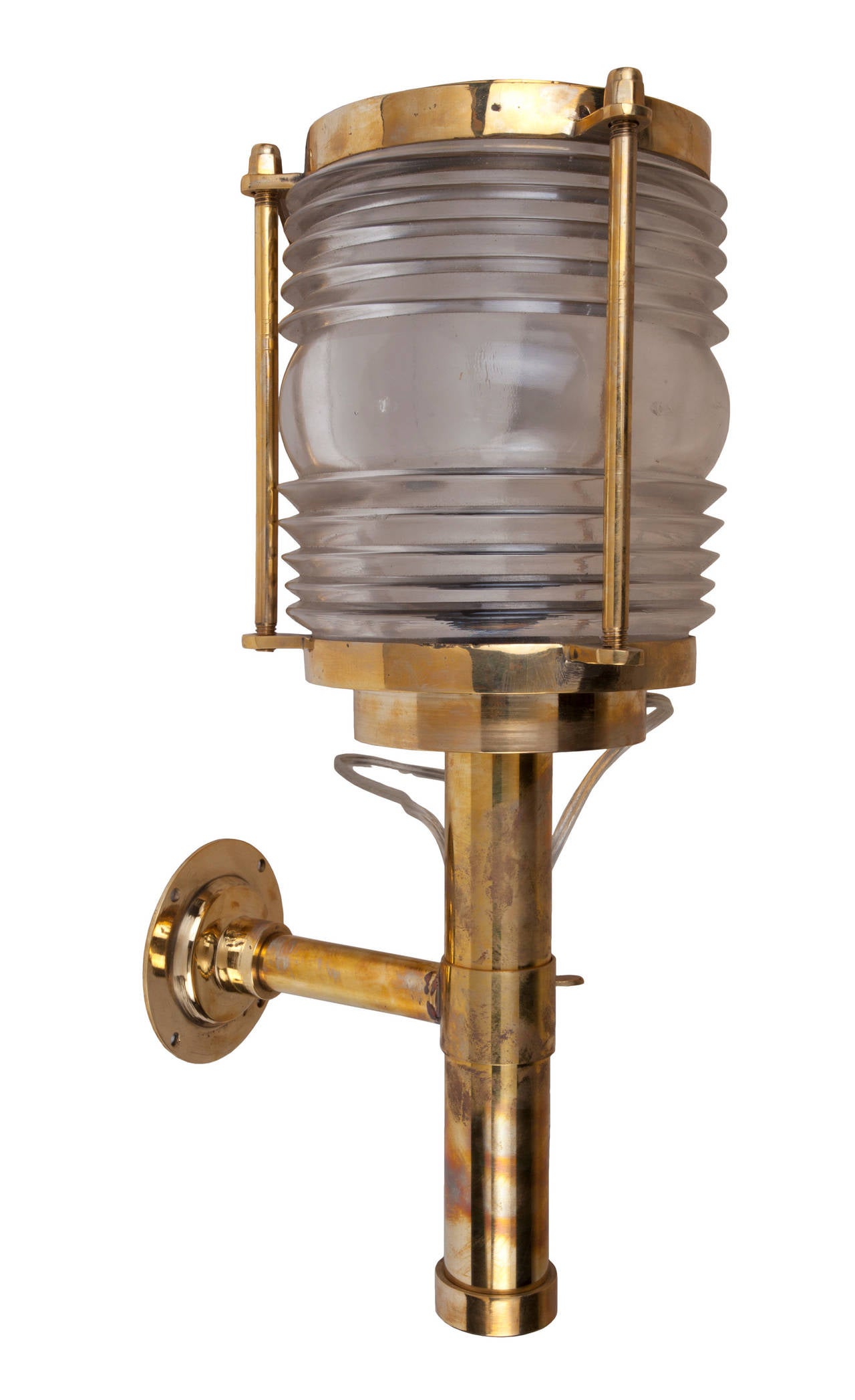 Pair of brass ship's passageway lights with fresnel lens with adjustable arm.  Mid-century.  Rewired for American use and takes a regular size light bulb.  Fine quality lighting, originally European.  Just the light portion is 8