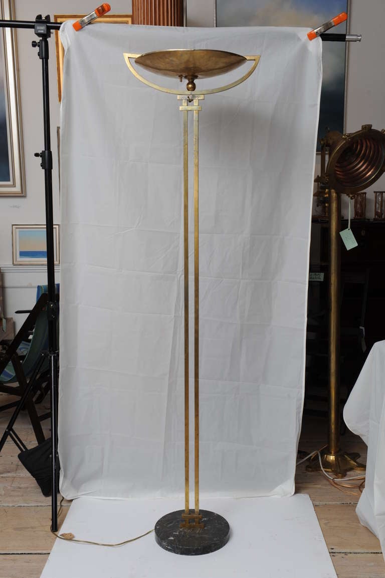 Deco period brass torchiere floor lamp on a granite base. Electrified for American use, as it was originally European-wired and takes two candelabra size light bulbs lying side by side. Base itself is 11.5 inches in diameter and just the dish is 15