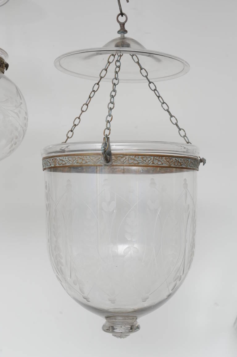 A late 19th century handblown bell jar hall lantern with smoke cap. It has a 10